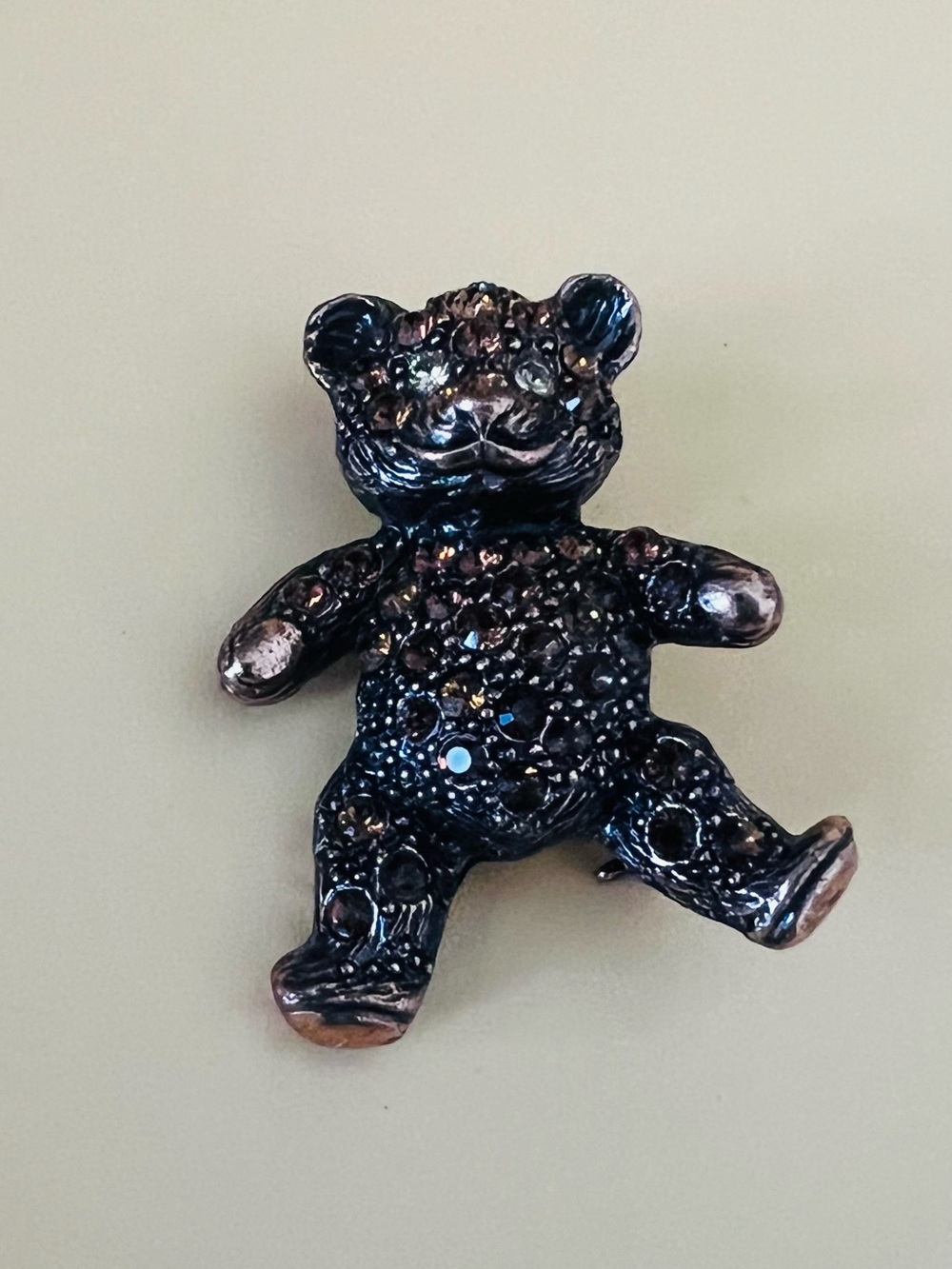 1928 brand teddy bear brooch, copper color with yellow rhinestones